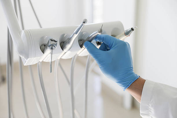 Professional Tooth Extraction technician working in West Sharyland, TX